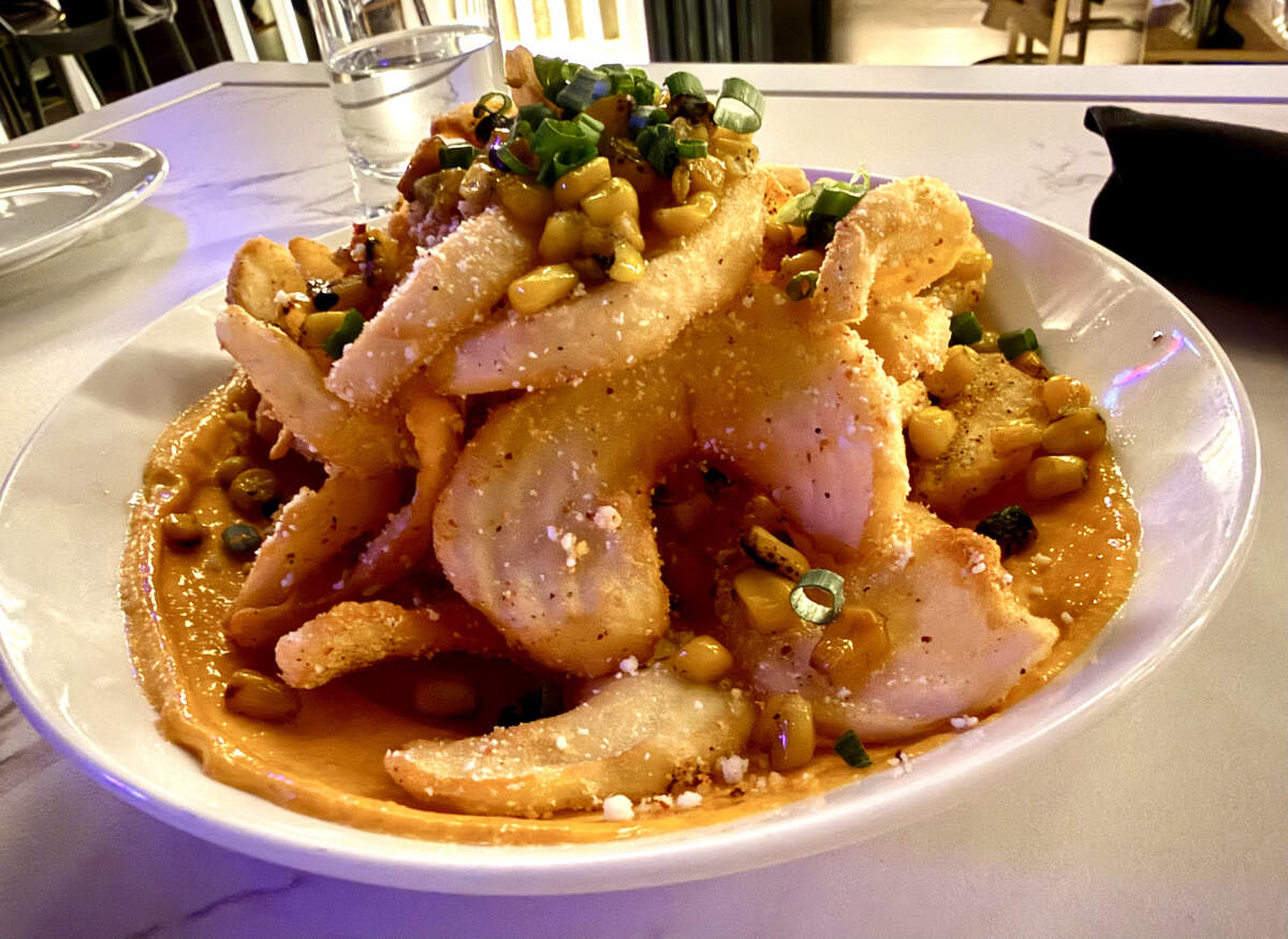 Búho at Grand Bohemian’s street corn fries, with Tajin spice, cotija and paprika aioli.