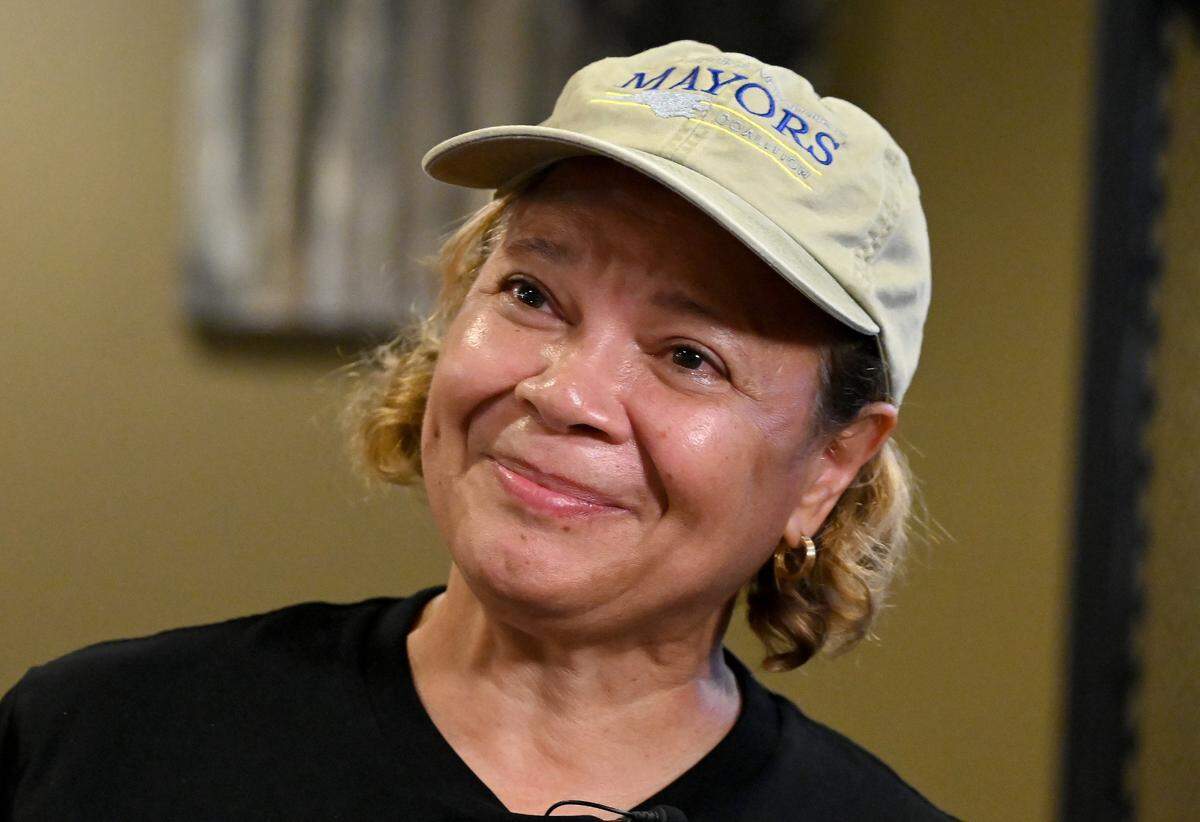 Charlotte Mayor Vi Lyles smiles as she listens to a question following her winning the Democratic primary in 2023.