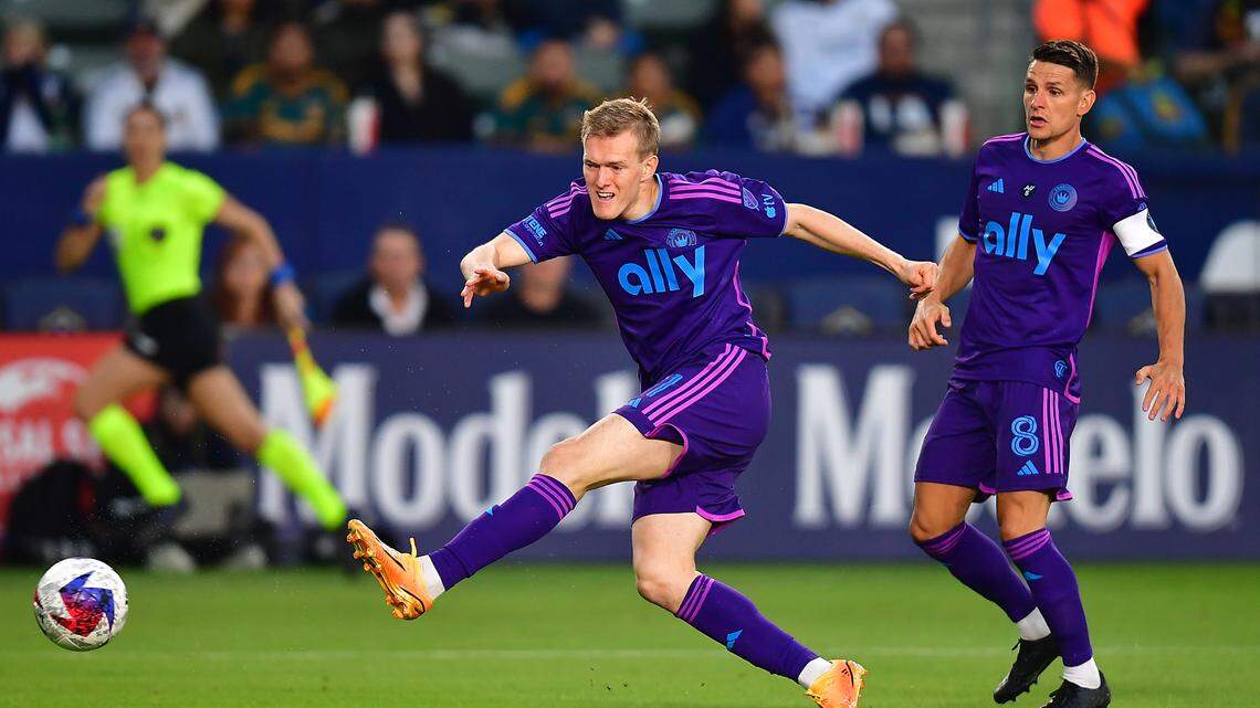 Charlotte FC forward Karol Swiderski (11) takes a shot on goal against the Los Angeles Galaxy during the first half at Dignity Health Sports Park. Gary A. Vasquez-USA TODAY Sports