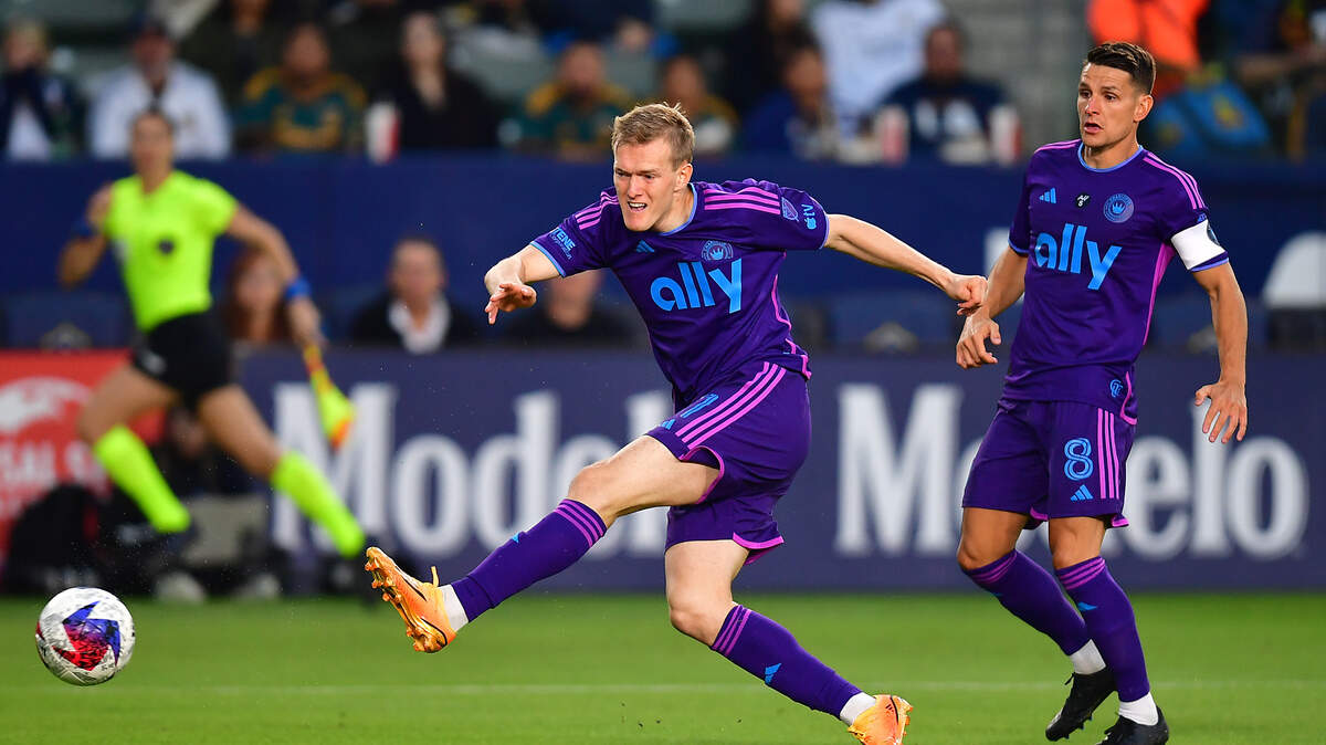 Charlotte FC forward Karol Swiderski (11) takes a shot on goal against the Los Angeles Galaxy during the first half at Dignity Health Sports Park. Gary A. Vasquez-USA TODAY Sports