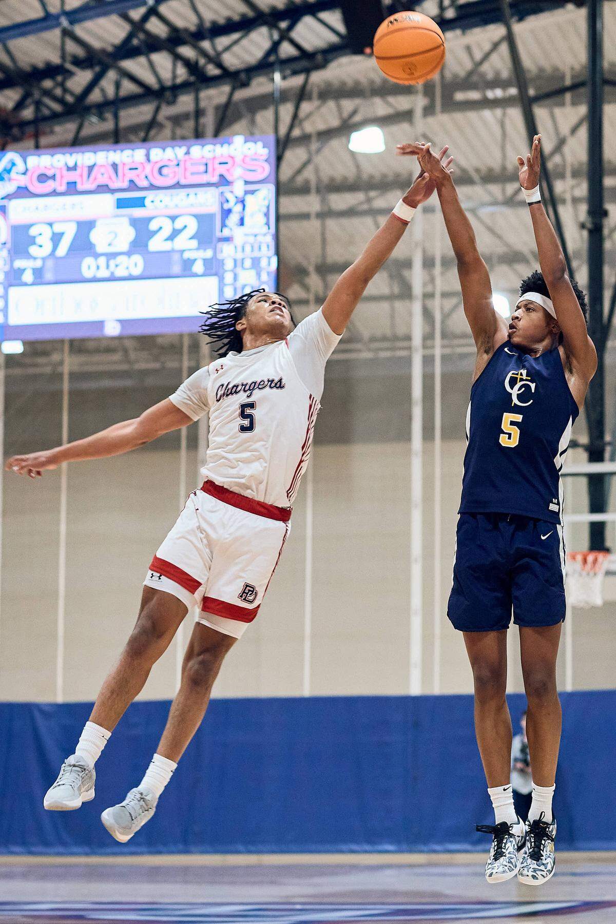 The Providence Day School Chargers forward Dylan Bradley (5) looks for the block in their 80-75 win over Carmel Christian in the NCISAA state semifinals on February 24, 2026.