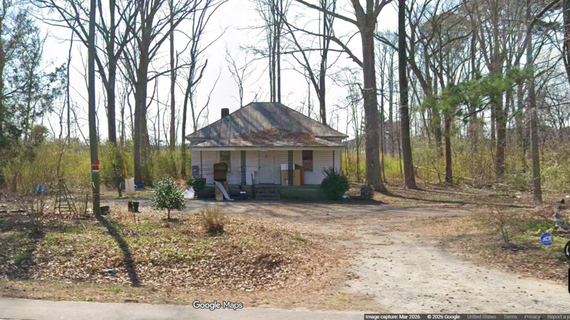 Murder victim found wrapped in tarp during welfare check at home, NC sheriff says