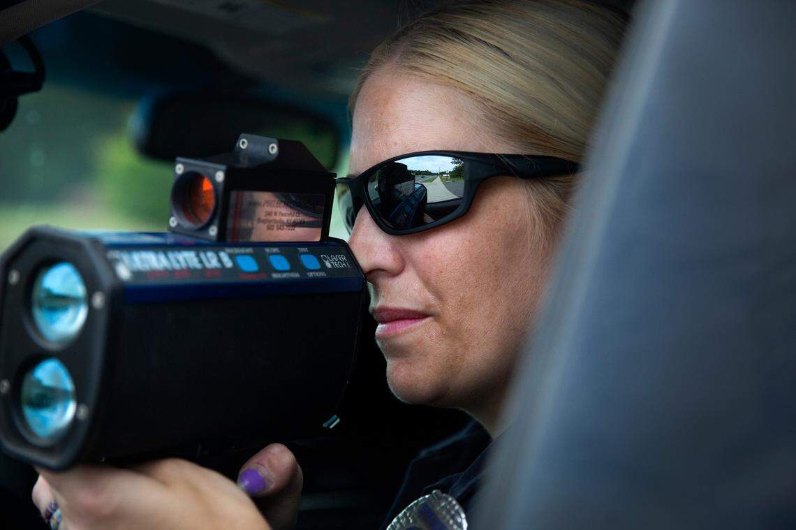Charlotte-Mecklenburg Police Officer Amanda Walters checks for motorists driving above the speed limit on Freedom Drive in Charlotte.