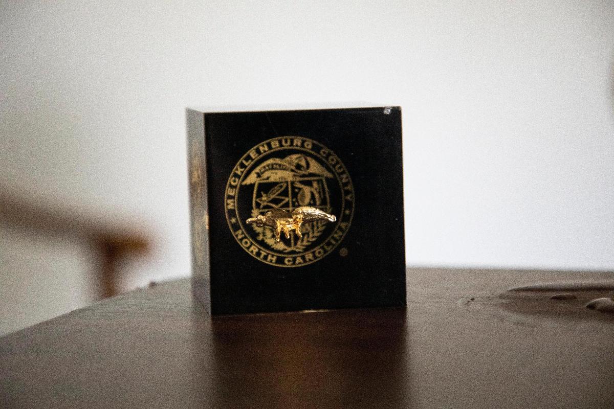In the Order of the Hornet award Harvey Boyd received you can see the Mecklenburg County seal he designed in the 1960s. In it he included the “Meck Dec,” a hornets nest, a nod to the then-present Mecklenburg County landscape, and a hope for beautiful skyline that is now has today.