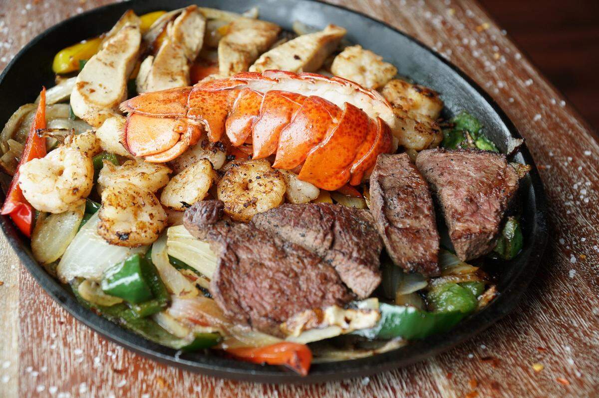 You can add on a lobster tail to your Tipsy Taco fajitas for $10 more.