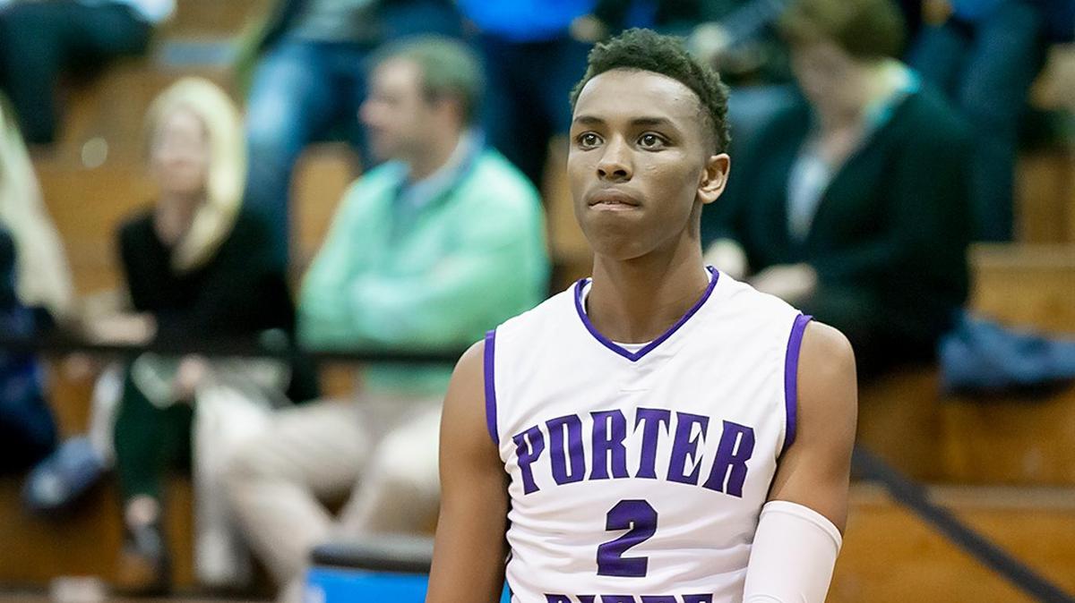Porter Ridge’s Cameron Stitt (2) runs through pre-game warmups.
