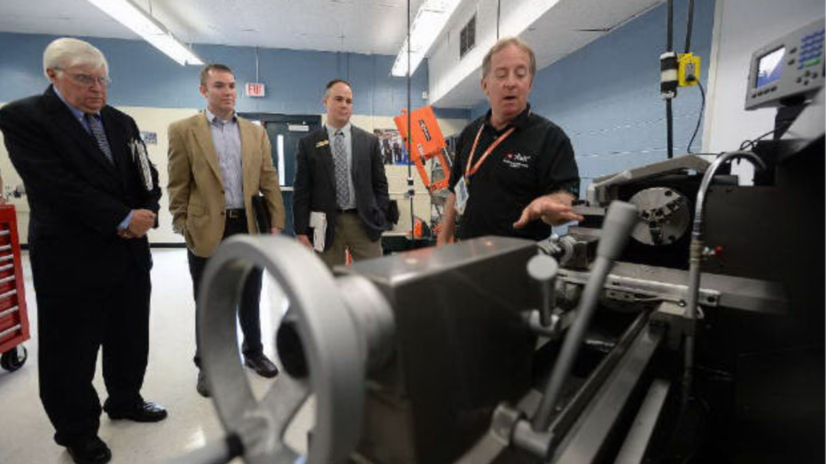 Engineering firm Bosch Rexroth will invest $58 million into a new customizing and research and development facility that will expand its operations for linear motion and assembly technologies in Charlotte. In this 2015 file photo, officials mark the opening of the $200,000 Bosch Rexroth Advance Manufacturing and Technology Center at Olympic Community of Schools.