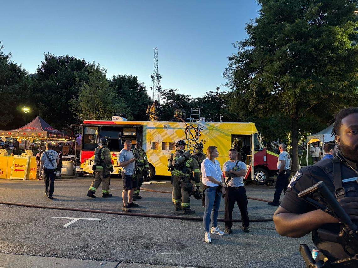 Firefighters work on a Bojangles food truck after it caught on fire at Lovin’ Life Music Fest in Charlotte on May 4, 2025.
