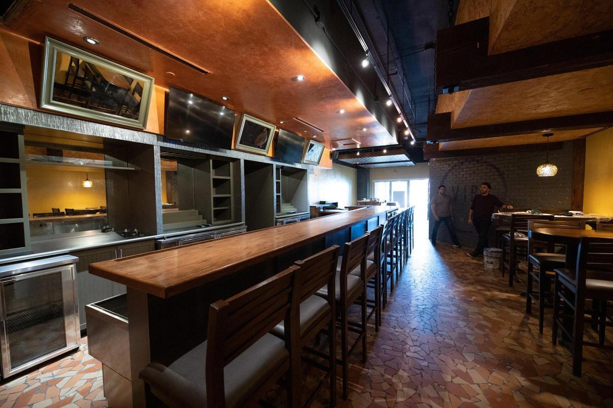 Antonio and Vasili Paspalaris said they want people to come into Vibe Cafe and Wine for coffee and linger for a few hours.