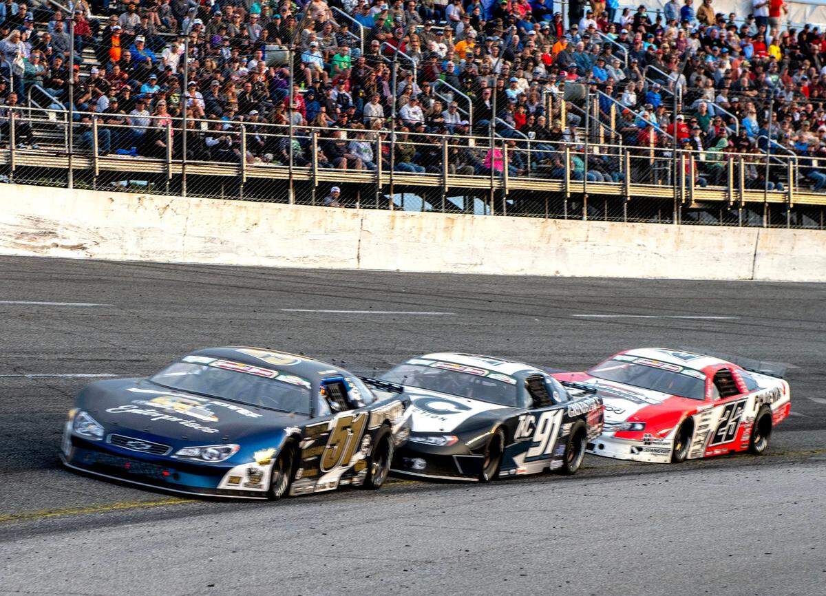 Racers make their way around the track during the 56th Annual Snowball Derby at Five Flags Speedway Sunday, December 3, 2023.