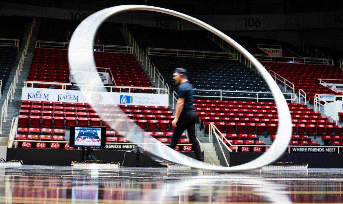 Cyr wheel performers go through their routines during the Cirque Du Soleil’s CORTEO rehearsal at the Bojangles Coliseum.