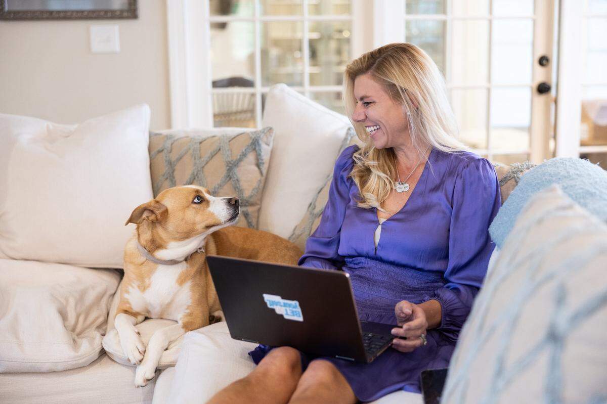 Former Charlotte TV anchor Molly Grantham (pictured at home with her family’s dog, Kure) has rebounded from a messy exit from Channel 3 News to find success with her new career path..