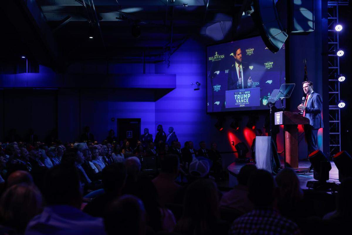 Senator JD Vance, the GOP vice presidential nominee, speaks to supporters during a rally at Freedom House Church in Charlotte, NC on Monday, September 23, 2024.