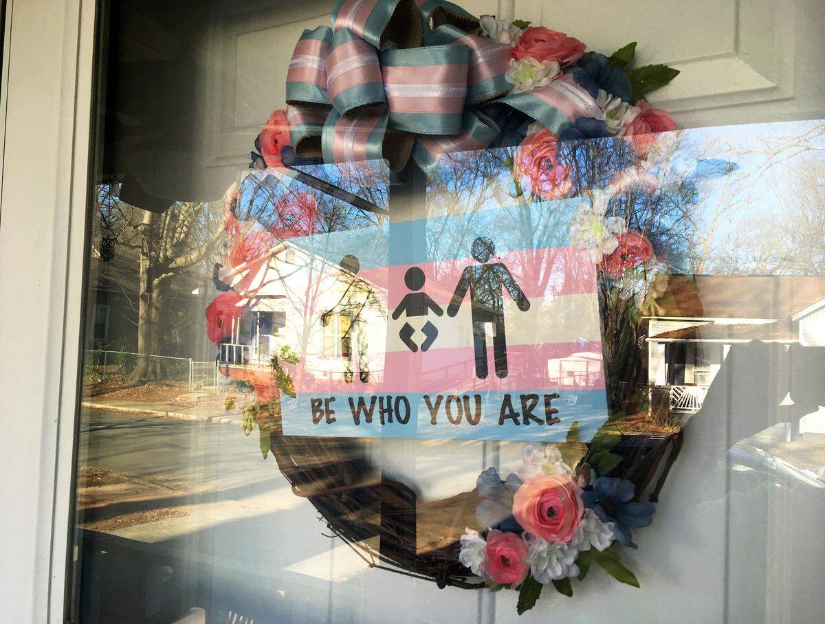 For Valentine’s Day, Liam and Duane hung a “Be who you are” wreath on their front door, showing two parents and a baby.