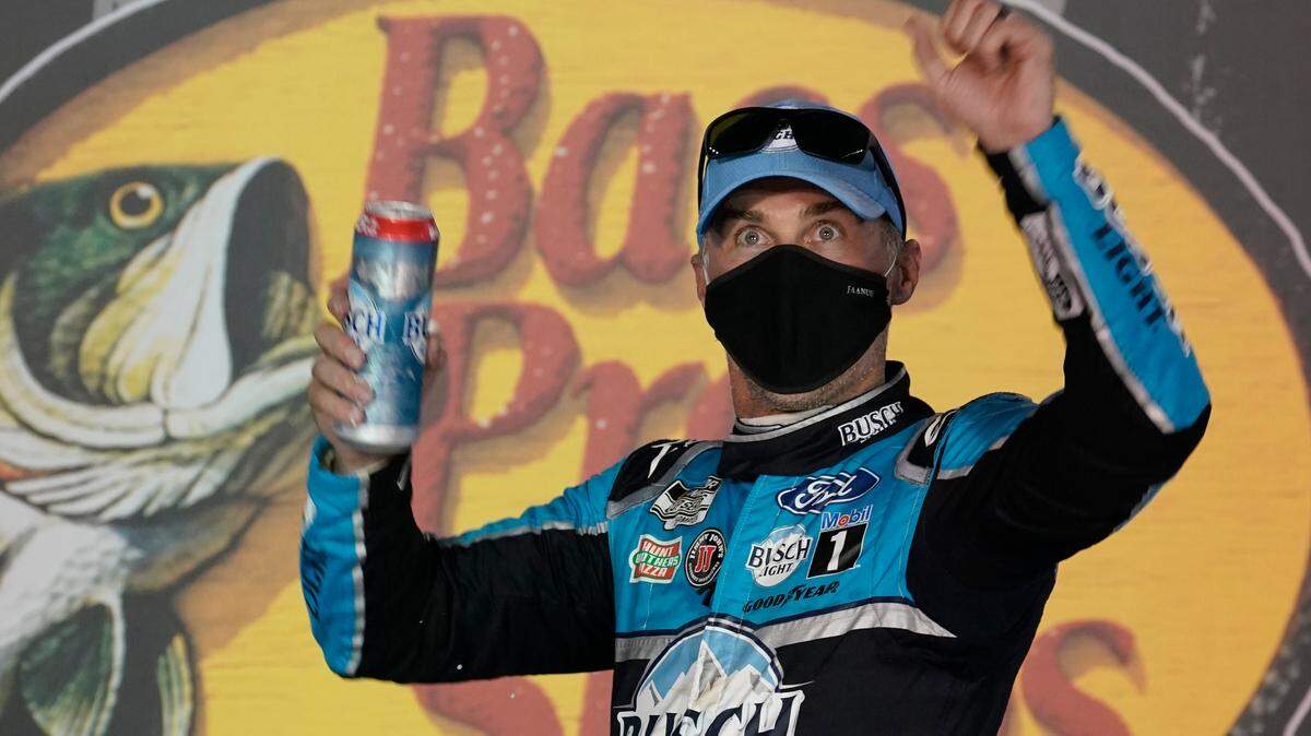 Kevin Harvick celebrates in Victory Lane after his win in the NASCAR Cup Series auto race Saturday, Sept. 19, 2020, in Bristol, Tenn. (AP Photo/Steve Helber)