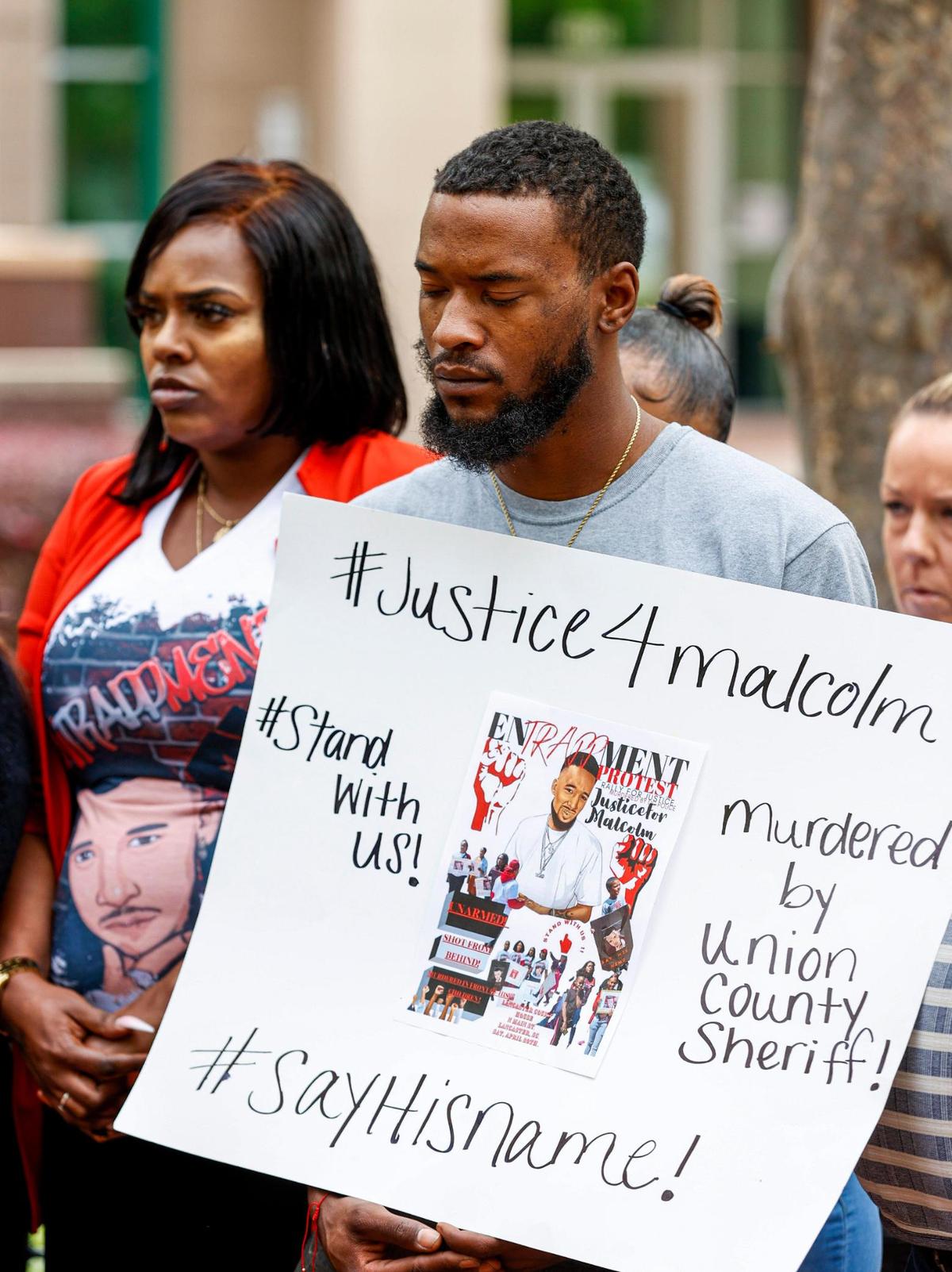 A supporter of the family of Malcolm Staton at a press conference at the Union County Courthouse in Monroe on April 29, 2022.