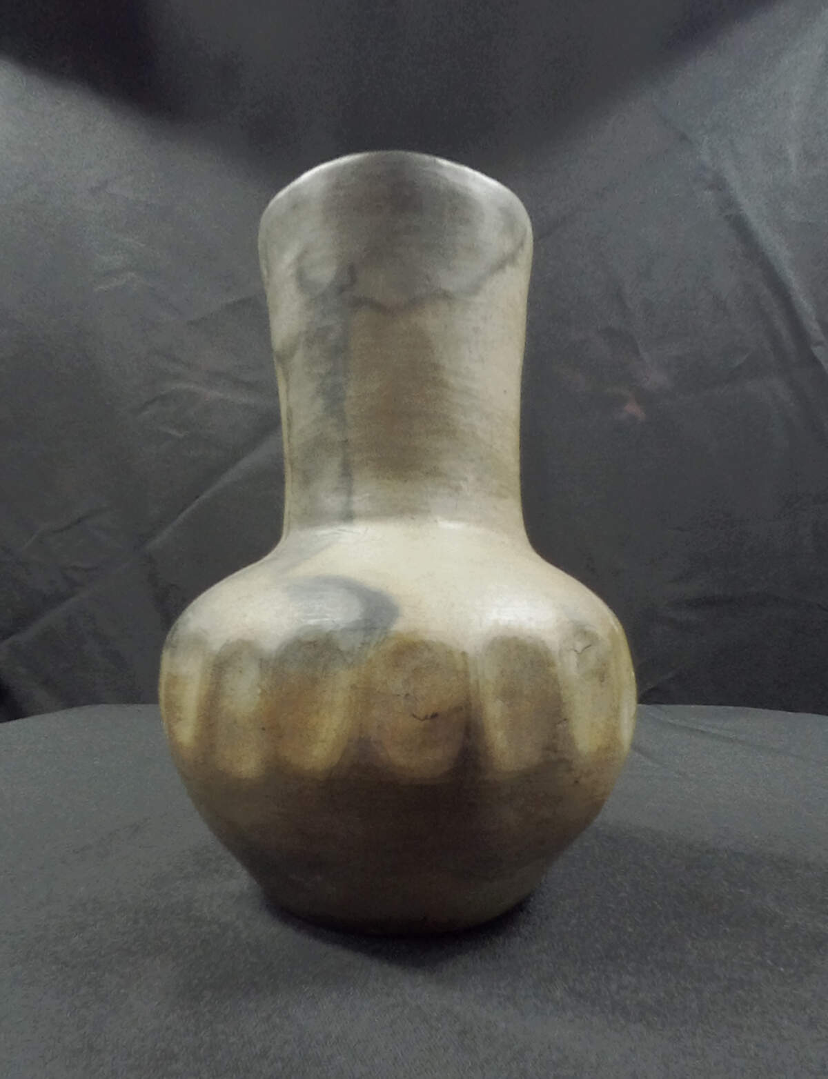 This 19th Century jar is by an unknown Catawba potter. Catawba Indians began making pottery about the time the Egyptians were building the pyramids.