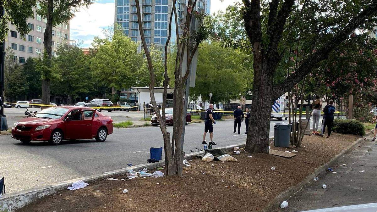 Two men are charged for their suspected involvement in a shootout in uptown Charlotte on Thursday, Aug. 11, 2022.