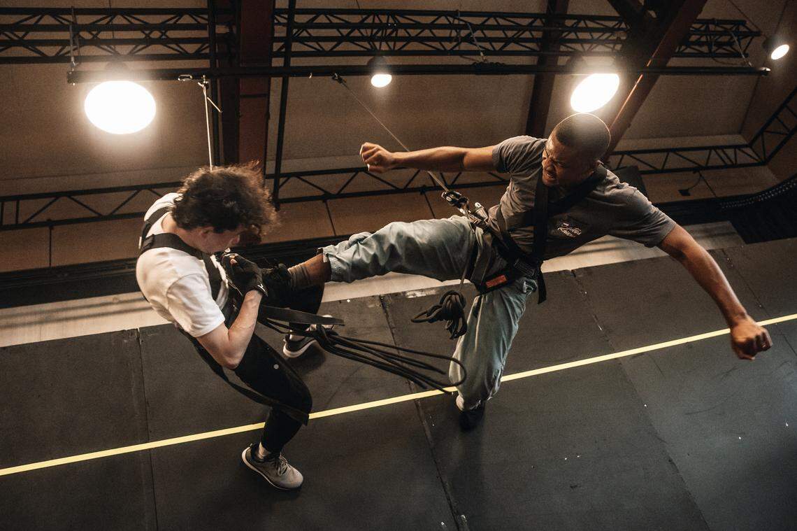 Actors Nathanael Saleh and Kyerron Dixon-Bassey in rehearsal for “The Hunger Games: On Stage.”