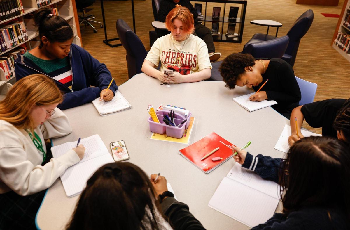 It’s writing time. Teens participate in a writing prompt at Inkspill, a writing group for youths ages 12 to 18.