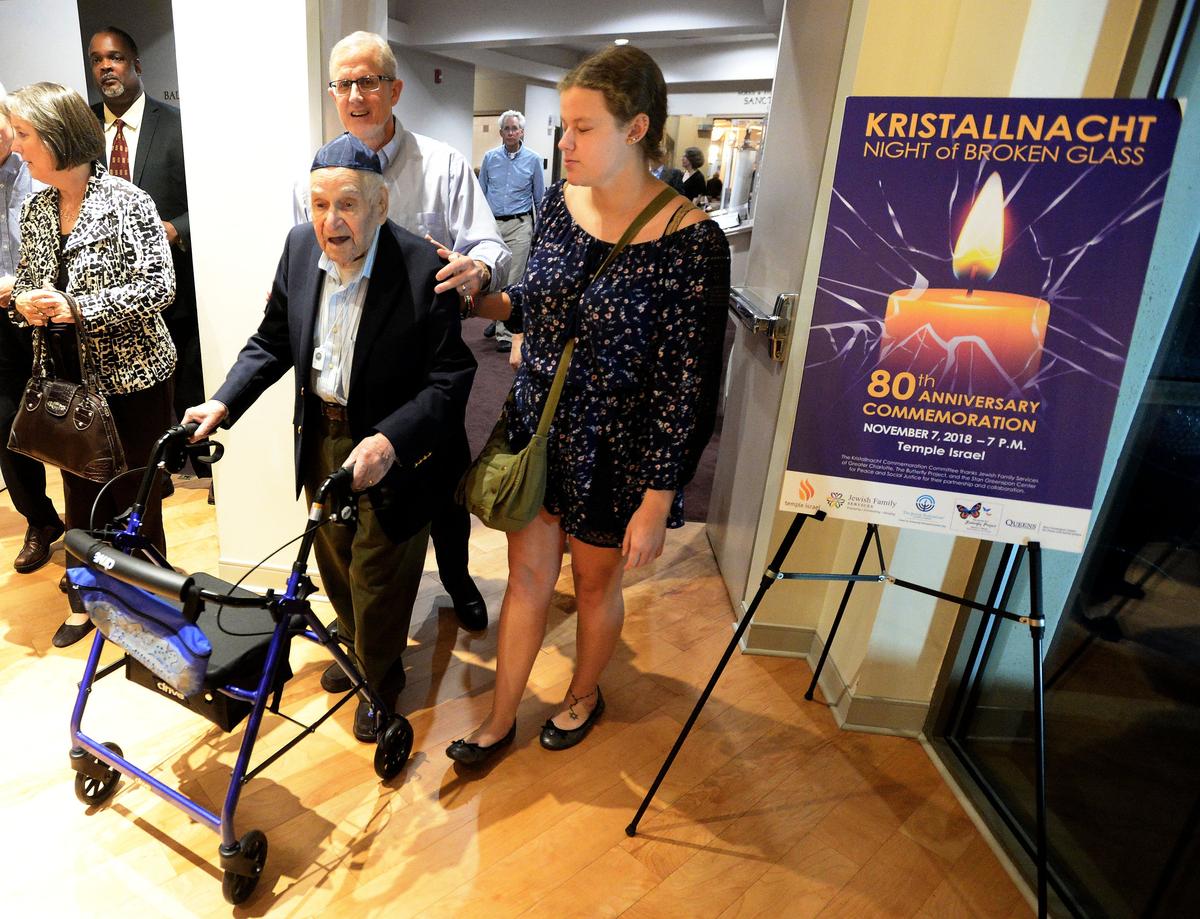 Henry Hirschmann, a Holocaust survivor born in Frankfurt, Germany in 1920, was among people gathered for an emotional event recently at Temple Israel marking the 80th anniversary of Kristallnacht, “The Night of Broken Glass.” The emotional remembrance included speeches, processions of Holocaust survivors, and music.