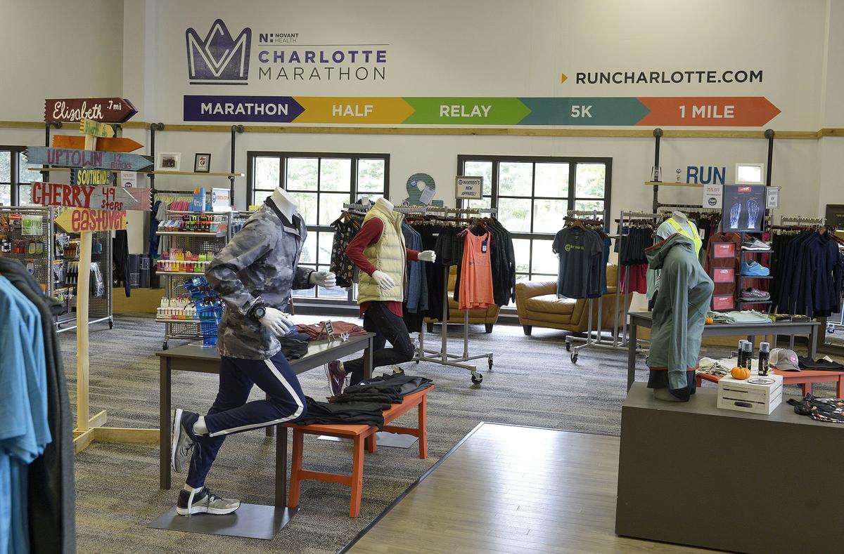 Charlotte Marathon-themed interior of the Midtown Run For Your Life store, one of two Charlotte area stores owned by Tim Rhodes, race director of the Charlotte Marathon and owner of Run For Your Life’s Midtown and Piper Glen stores.