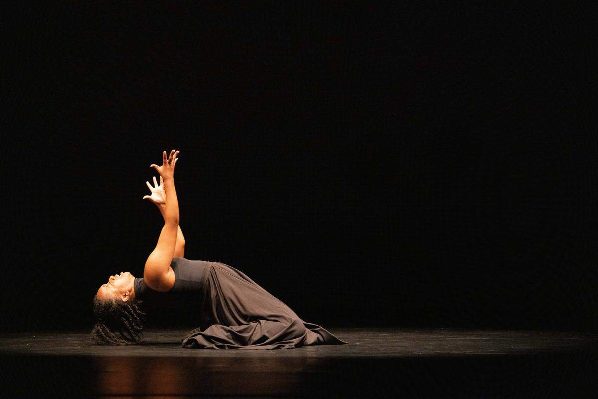 Ashley Tate performing at the 2024 Faculty Dance Concert at UNC Charlotte.