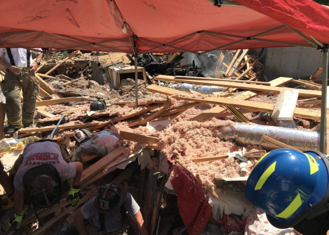 Mecklenburg EMS and Charlotte Fire Department during rescue operations at Ballantyne home