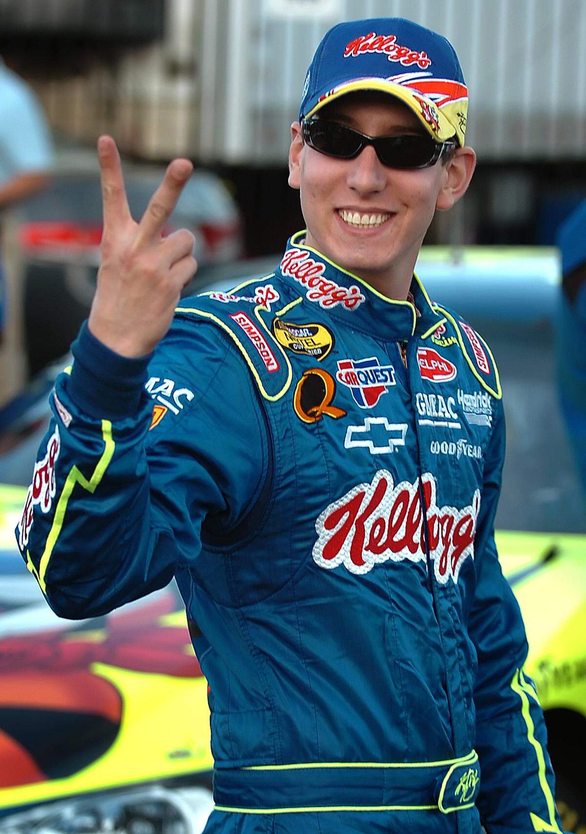 5/19/06 NASCAR NEXTEL Cup driver Kyle Busch points out to a passerby that he would be competing in two events Friday night at Lowe's Motor Speedway. Kyle Busch qualified for the NASCAR NEXTEL All-Star Challenge and drove in the Quaker Steak & Lube 200 truck race. Busch won the race.  JEFF SINER - jsiner@charlotteobserver.com