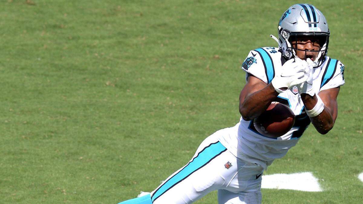 Carolina Panthers linebacker Tahir Whitehead, bottom frame, is called for pass interference for a hit on Las Vegas Raiders wide receiver Hunter Refrow, center, during fourth quarter action on Sunday, September 13, 2020 at Bank of America Stadium in Charlotte, NC. Panthers defensive back Rasul Douglas, top, was attempting to intercept the pass. The Raiders defeated the Panthers 34-30.