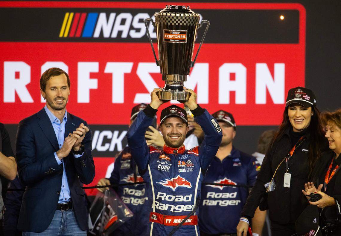 NASCAR Truck Series driver Ty Majeski celebrates after winning the 2024 championship and the NASCAR Truck Series championship race at Phoenix Raceway.