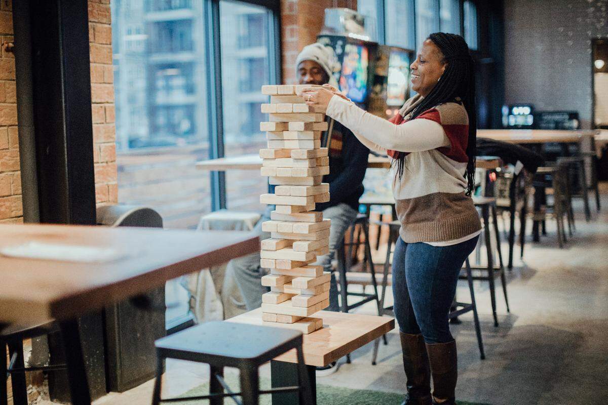 Treat your loved one to a day at Pins Mechanical, a family-friendly bar with an arcade that features duckpin bowling, ping pong, foosball and more.