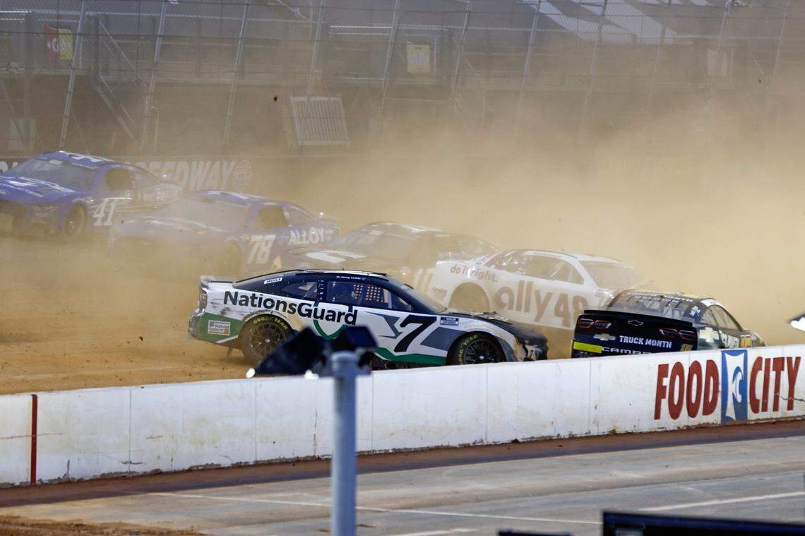 Driver’s Corey LaJoie (7), Alex Bowman (48) and Noah Gragson (16) wreck coming out of Turn 2 during a NASCAR Cup Series auto race, Sunday, April 17, 2022, in Bristol, Tenn. (AP Photo/Wade Payne)