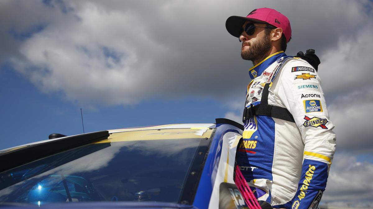 CONCORD, NORTH CAROLINA - OCTOBER 10: Chase Elliott, driver of the #9 NAPA Auto Parts Chevrolet, enters his car to start the NASCAR Cup Series Bank of America ROVAL 400 at Charlotte Motor Speedway on October 10, 2021 in Concord, North Carolina. (Photo by Jared C. Tilton/Getty Images)