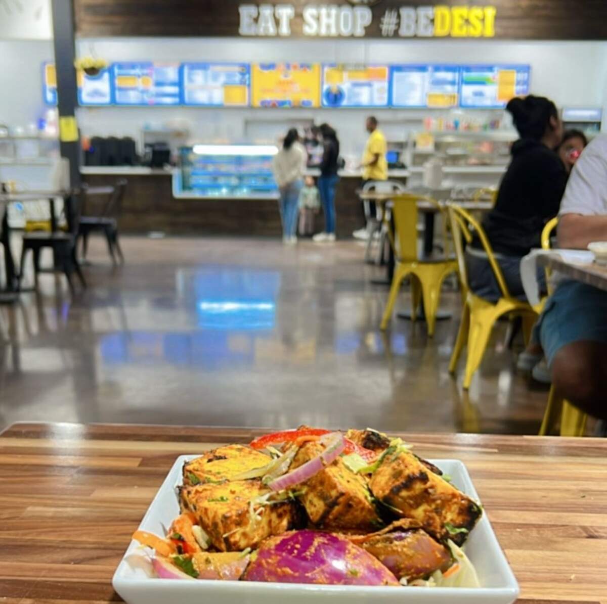 Desi District offers a variety of fast-casual Indian cuisine options, including Chicken Tikka Kabab.
