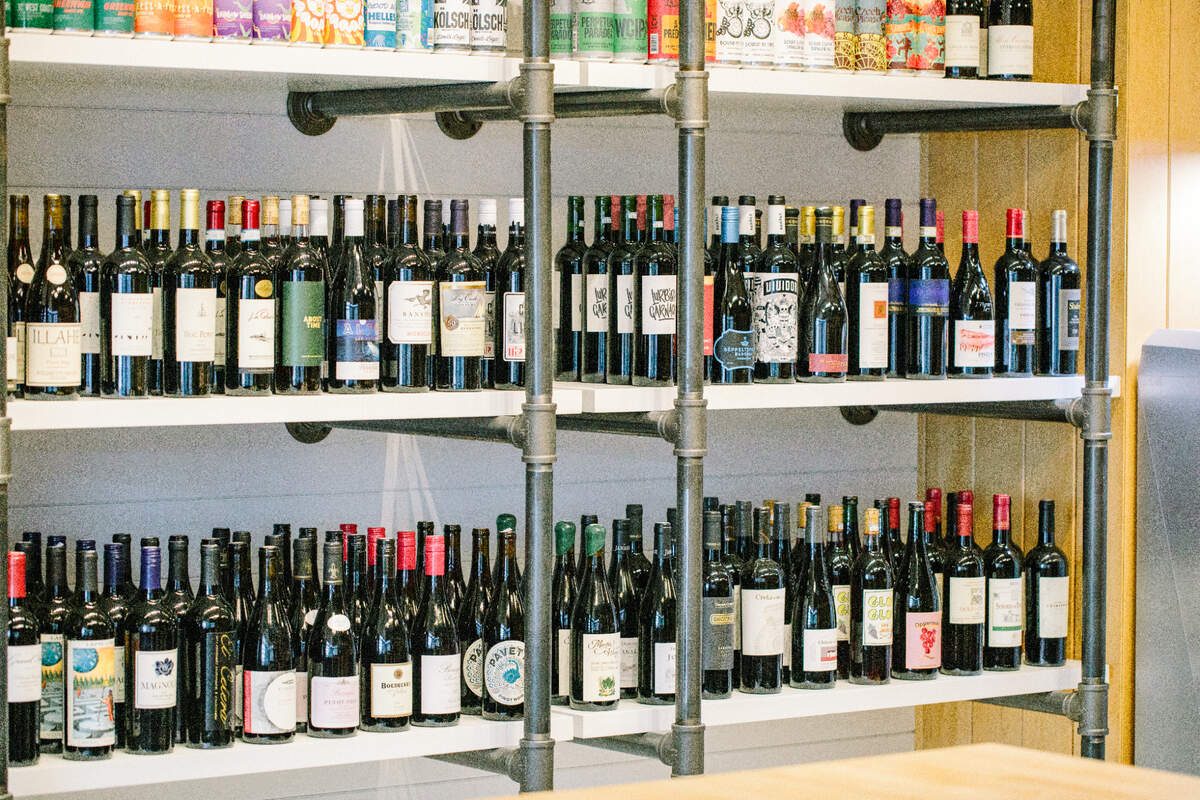 The Exchange uptown sells sodas and cold beverages, artisanal and specialty snacks, to-go sandwiches, greeting cards, gifts and beer and wine for retail purchases