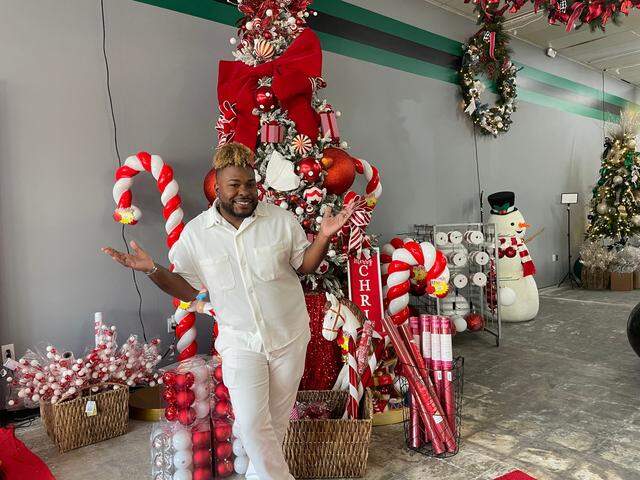 Holiday House and Co. owner Lance “Mr. Christmas” Devereux. Holiday House is a new Christmas pop-up retail store and photo studio.