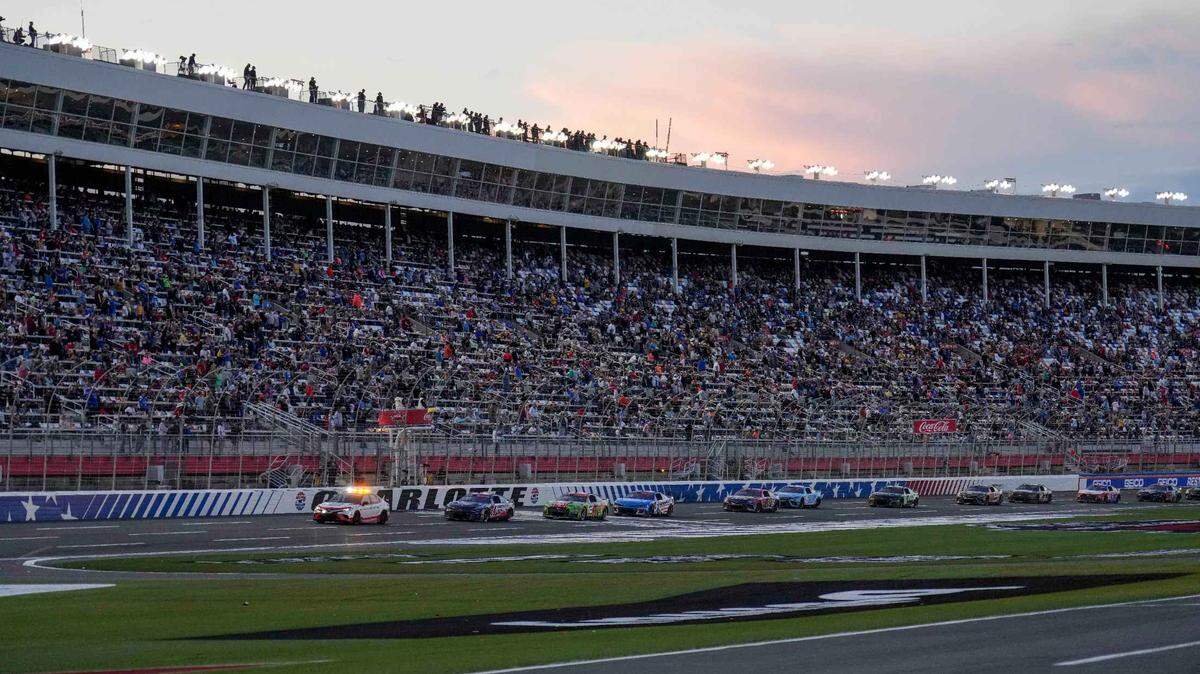 The sun sets during the Coca-Cola 600 at Charlotte Motor Speedway in 2023.