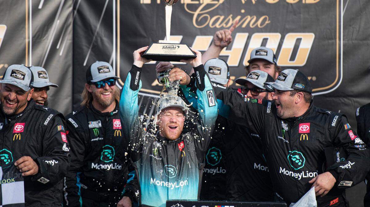 NASCAR Cup Series driver Tyler Reddick (45) celebrates winning the NASCAR Cup Series Hollywood Casino 400 at Kansas Speedway.