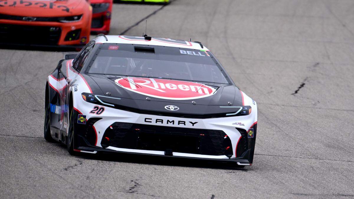 Jun 23, 2024; Loudon, New Hampshire, USA; NASCAR Cup Series driver Christopher Bell (20) leads a pack of cars during the USA TODAY 301 at New Hampshire Motor Speedway.