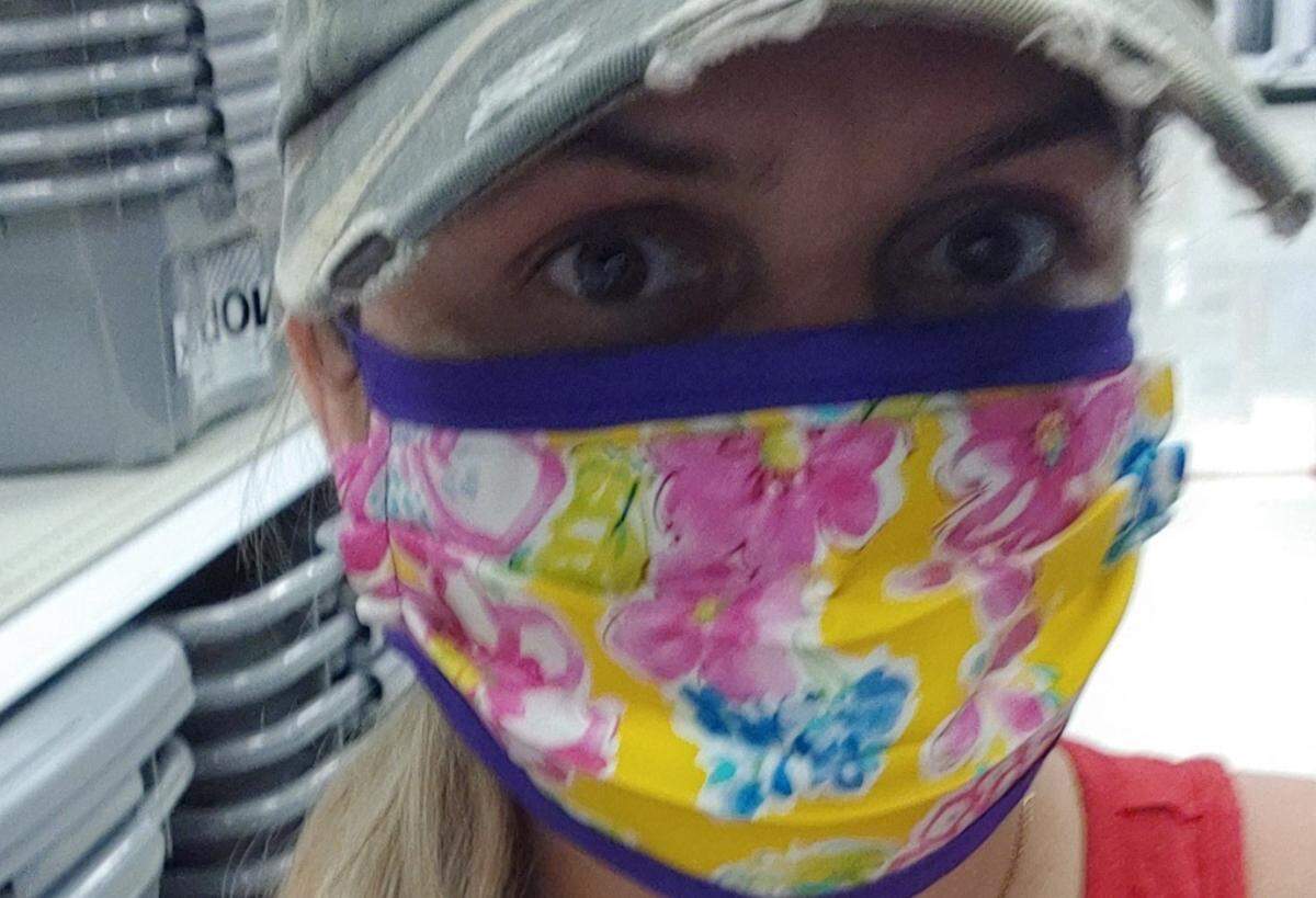 Crystal Newman got her vibrant mask from The Good Dogg, a Charlotte-based business.