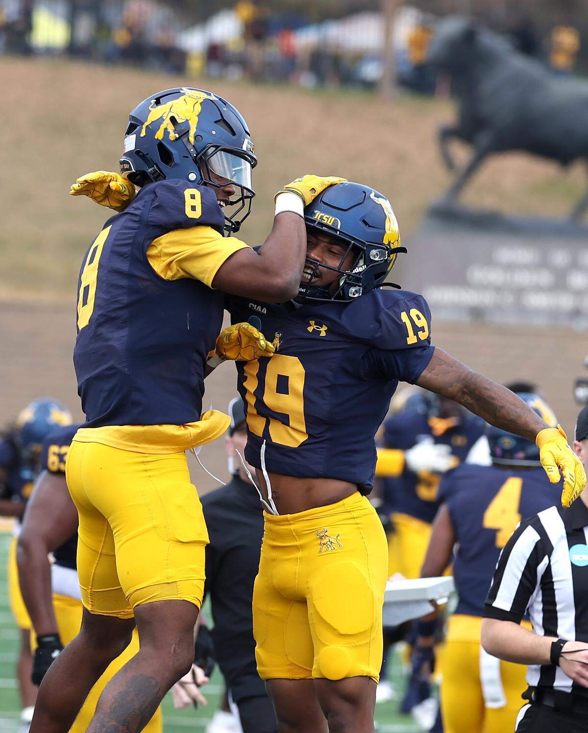 Johnson C. Smith University Golden Bulls defensive back TyQuereon Hines, left, and defensive back D. Trevar Williams celebrate Hines' interception of a pass meant for Frostburg State wide receiver Jevonn Gilyard during action at the Irwin Belk Complex in Charlotte, NC on Saturday, November 22, 2025. 