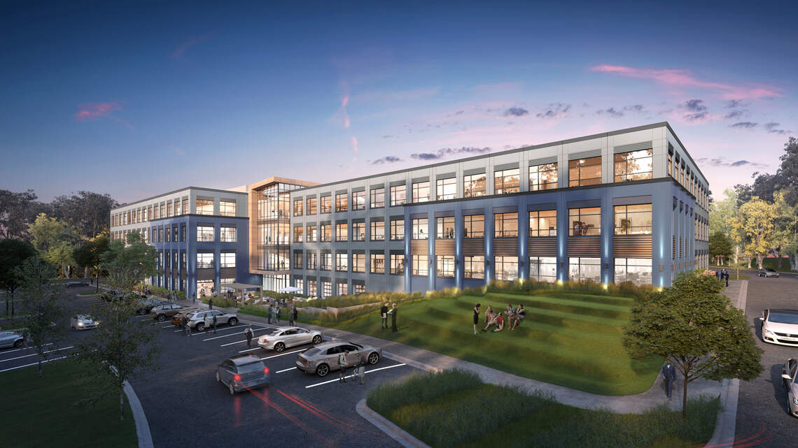 This building under construction will add offices to fast-growing University area
