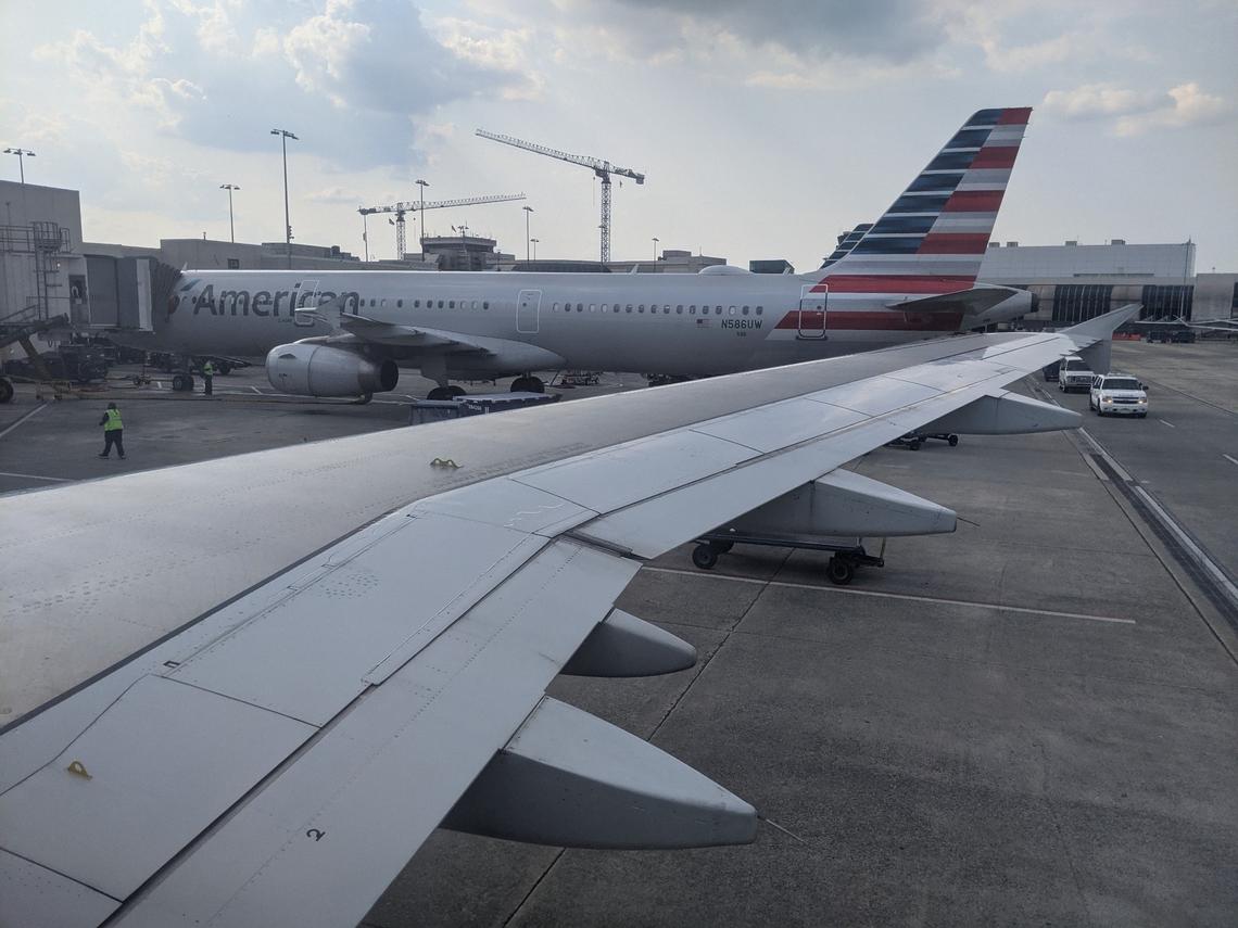 An American Airlines flight from Charlotte Douglas International Airport was delayed after some passengers refused to wear masks.