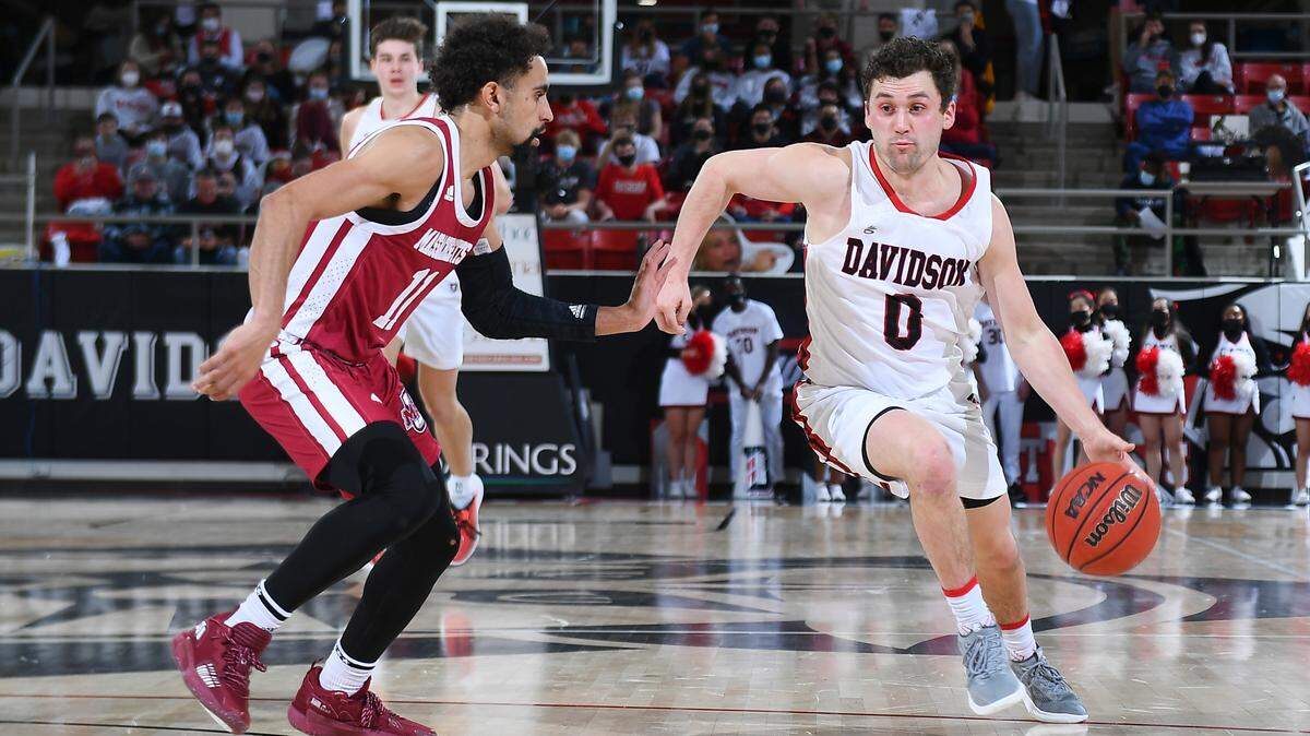 Davidson point guard Foster Loyer drives in a game against Massachusetts in January. Loyer transferred from Michigan State, the team the Wildcats play in a first-round NCAA tournament game Friday.
