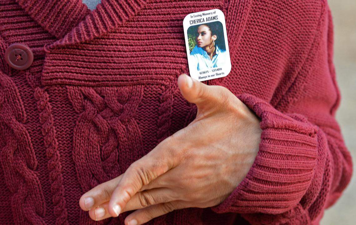 Chancellor Lee Adams wears a button in memory of his mother, Cherica Adams.