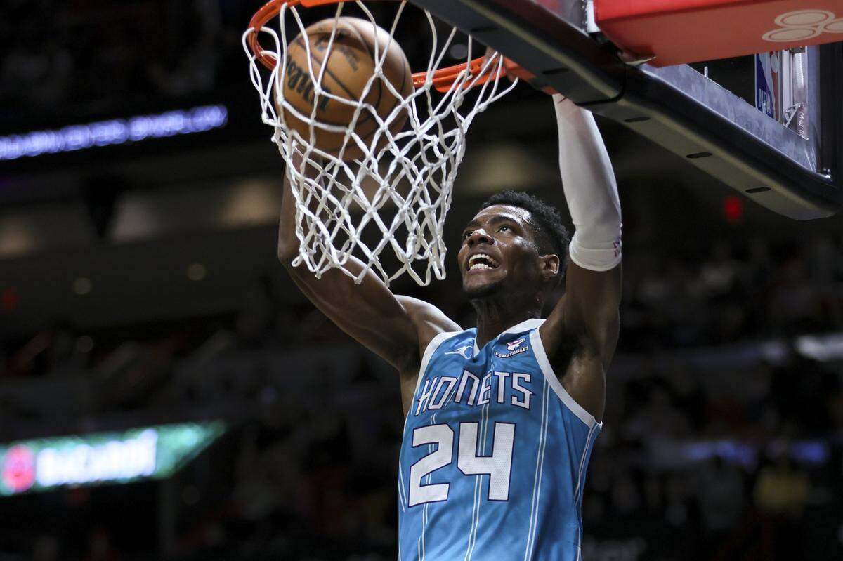 Charlotte Hornets forward Brandon Miller (24) dunks the basketball against the Miami Heat during the second quarter at Kaseya Center.