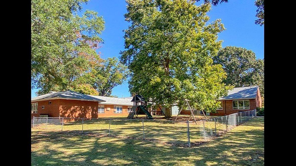 The property has ample parking and a large, fenced backyard, according to its listing.&nbsp;