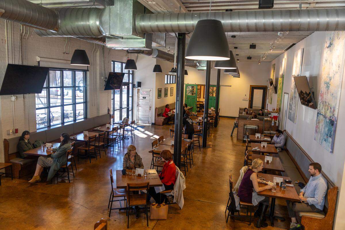 Community Matters Cafe, a life skills program for students graduating from substance abuse recovery programs at Charlotte Rescue Mission, opened in 2019 in a revitalized textile factory.