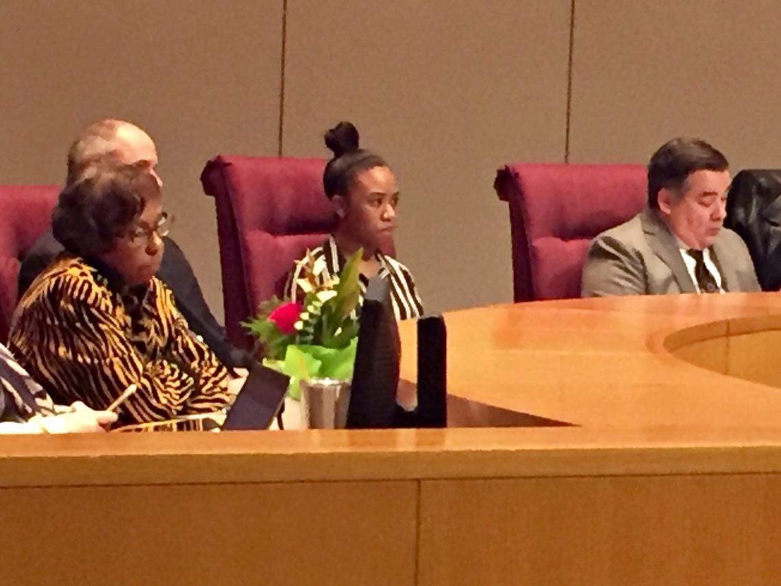 Northwest School of the Arts student Kendall Sanders (center) joined the CMS board as a nonvoting adviser Tuesday.